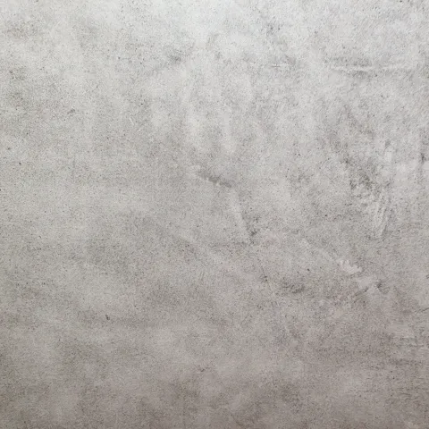 Béton ciré gris aux traces de taloche